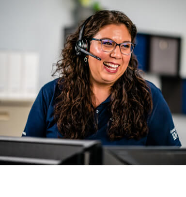 USAA customer service agent smiling into her headset.