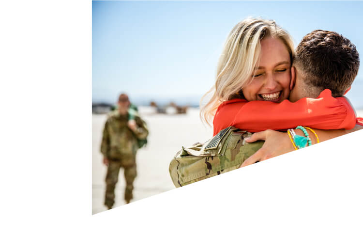 Military couple, happily embracing