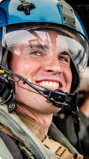 Young recruit in comms helmet