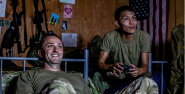 Deployed military soldiers playing video games