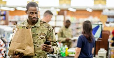 Military man with groceries