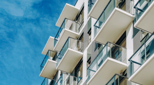 A high-rise condo has several patio balconies