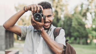 Person takes picture with camera